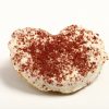 Palmerita Red Velvet de hojaldre con cobertura de crema de queso.
