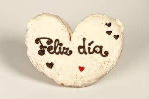 Palmerón grande con cobertura de chocolate blanco y relleno opcional de nata.