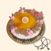 Tarta San Marcos con nata, trufa y yema tostada.