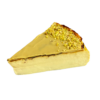 Porción de tarta de queso con pistacho de textura cremosa y aspecto apetecible.